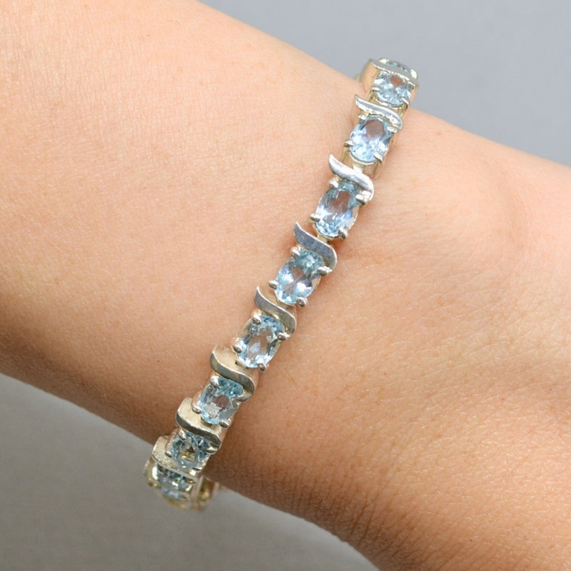 Sky Blue Topaz Tennis Bracelet in Sterling Silver UK Hallmarked (12 carats)