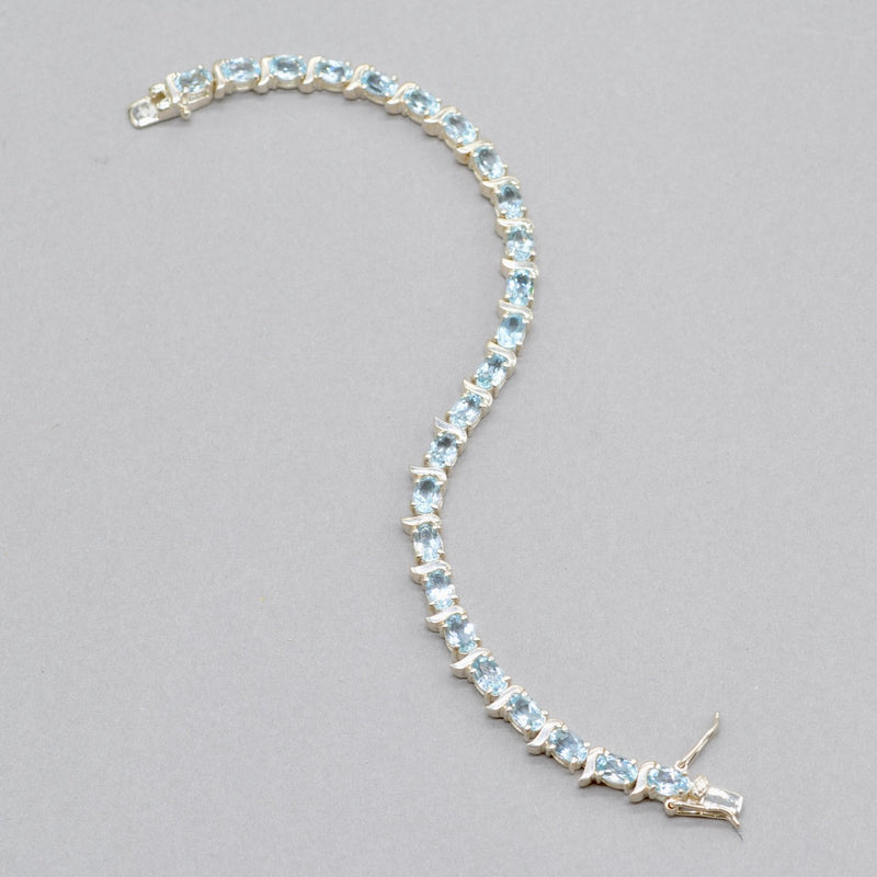 Sky Blue Topaz Tennis Bracelet in Sterling Silver UK Hallmarked (12 carats)