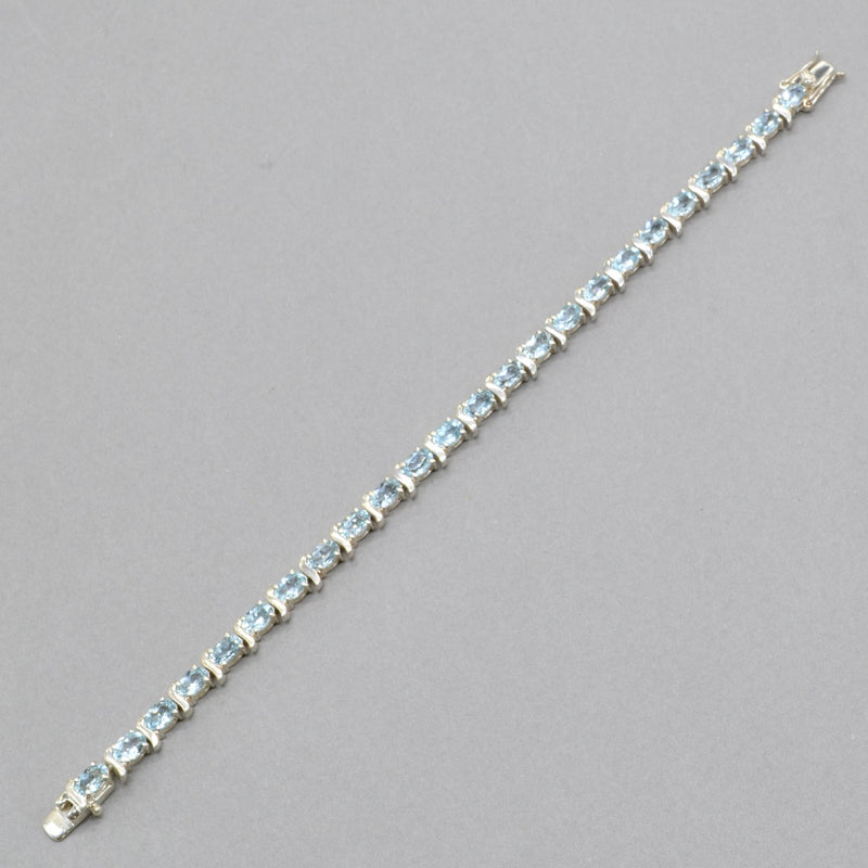 Sky Blue Topaz Tennis Bracelet in Sterling Silver UK Hallmarked (12 carats)