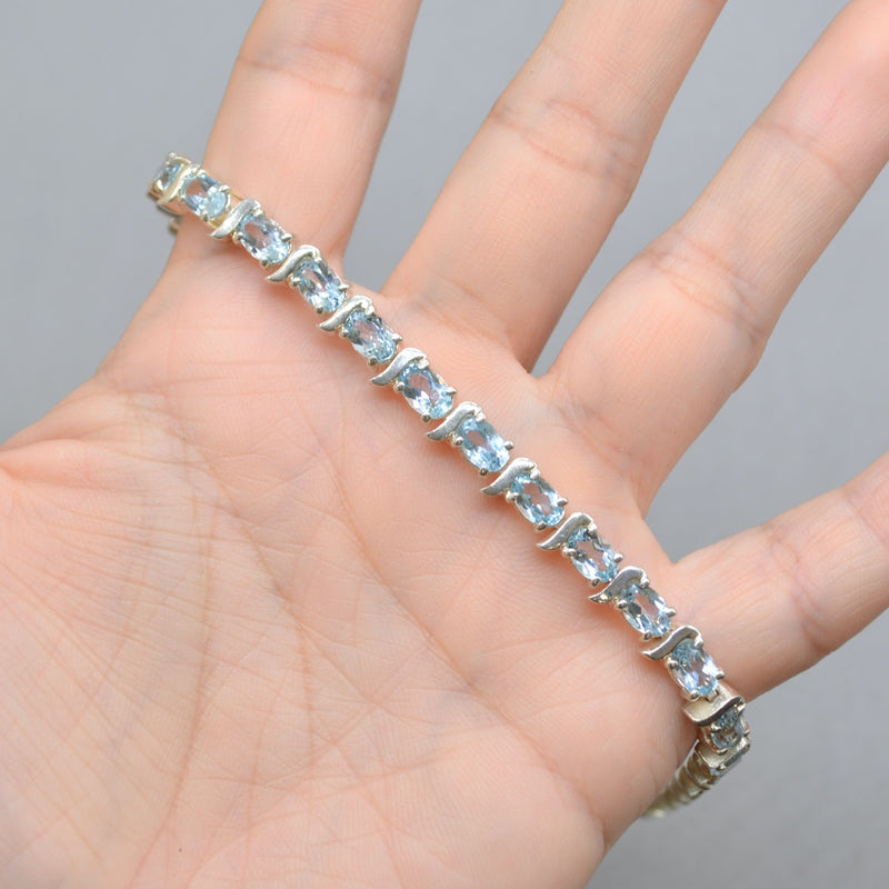 Sky Blue Topaz Tennis Bracelet in Sterling Silver UK Hallmarked (12 carats)