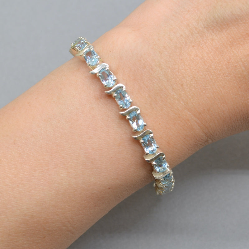 Sky Blue Topaz Tennis Bracelet in Sterling Silver UK Hallmarked (12 carats)