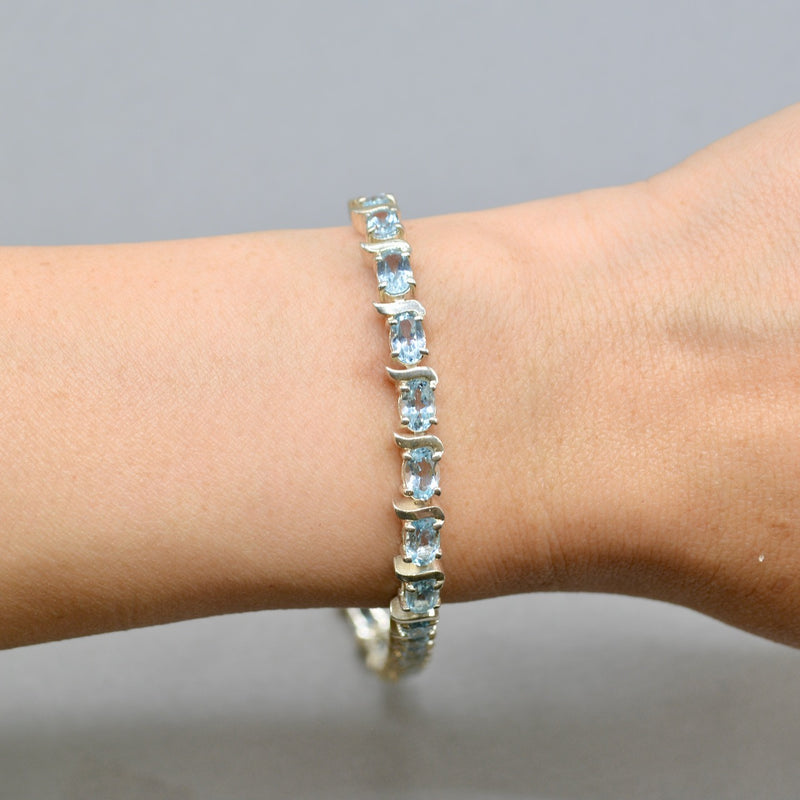 Sky Blue Topaz Tennis Bracelet in Sterling Silver UK Hallmarked (12 carats)