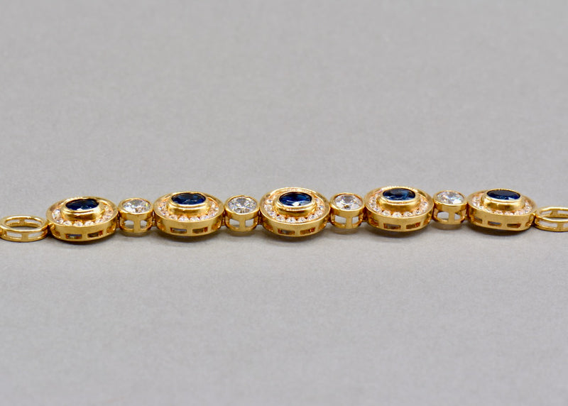 9ct Yellow Gold Blue & White Cubic Zirconia Halo Bracelet